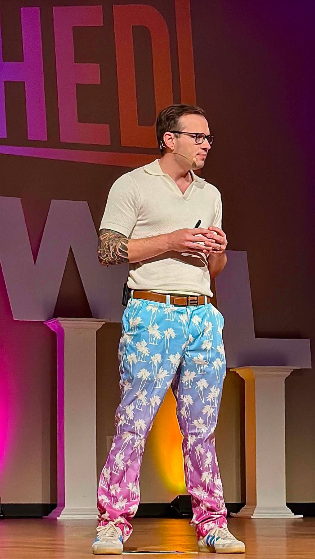 Austin Armstrong speaking onstage